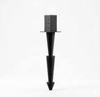 Black metal plant support stake with square top on a white background