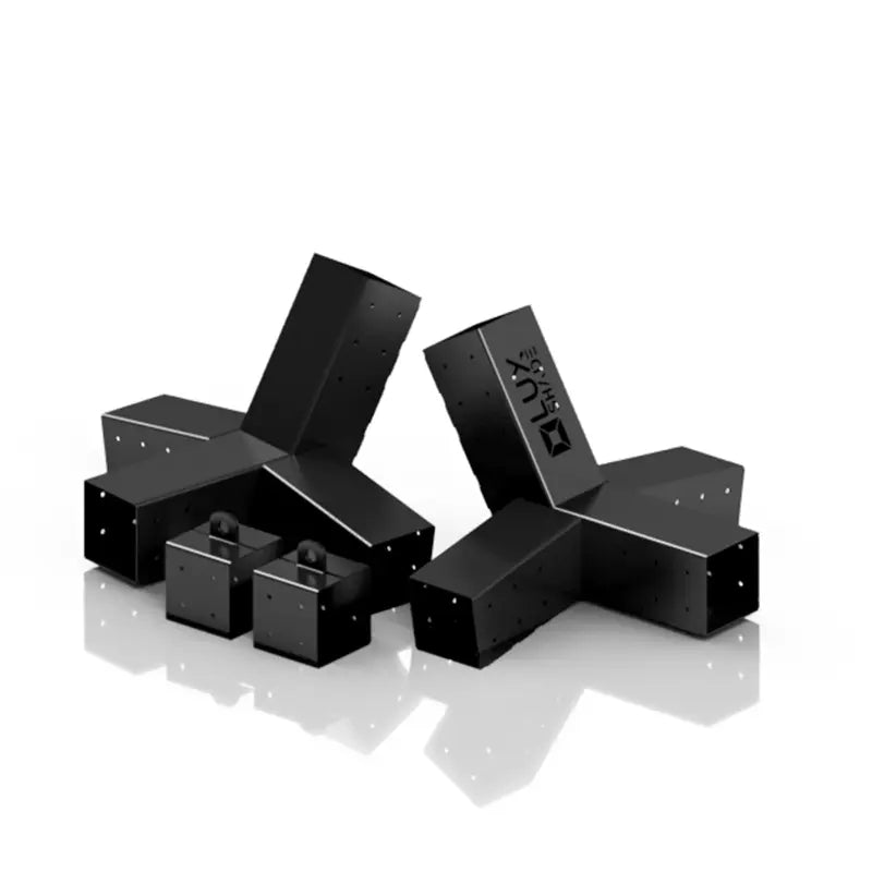 Hammock on a stand in a backyard setting with trees and rocks.